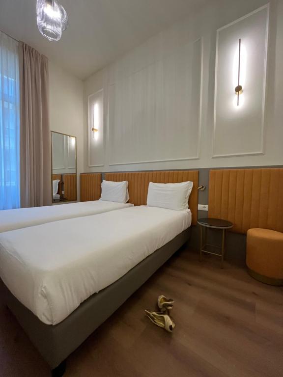 Postel nebo postele na pokoji v ubytování Hotel Duca D'Aosta