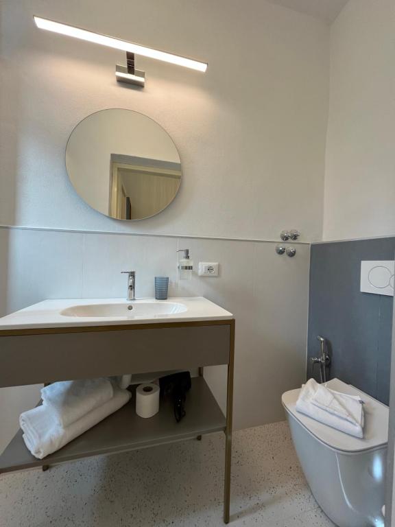 Koupelna v ubytování Hotel Duca D'Aosta