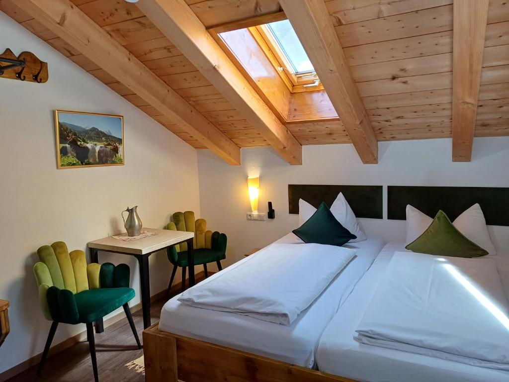 Postel nebo postele na pokoji v ubytování Haus Miele