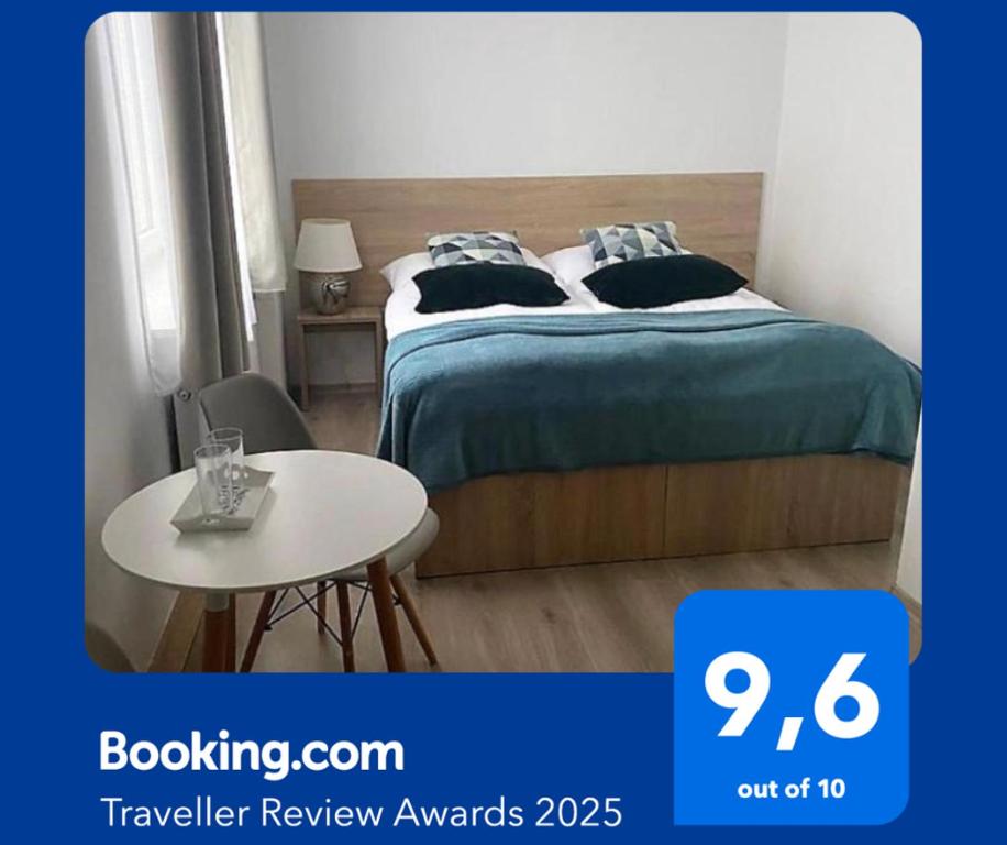 A bed or beds in a room at Jedlinka