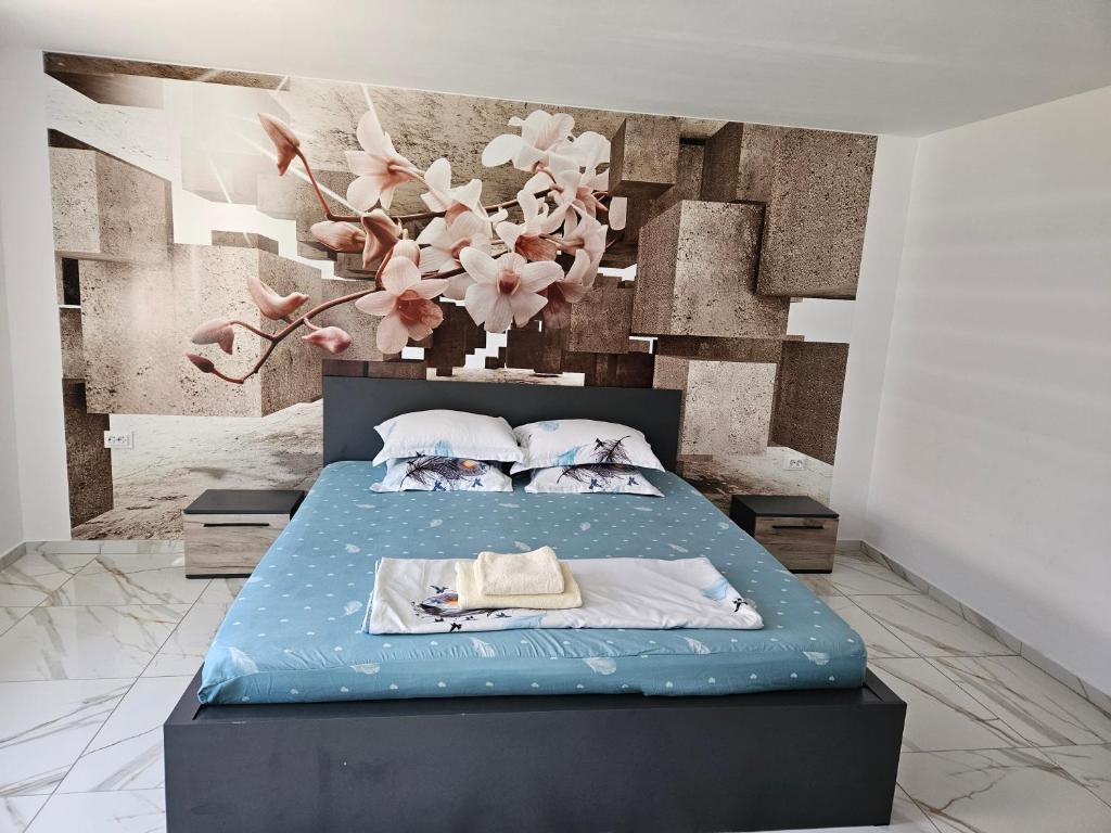 Postel nebo postele na pokoji v ubytování Casa Andreea