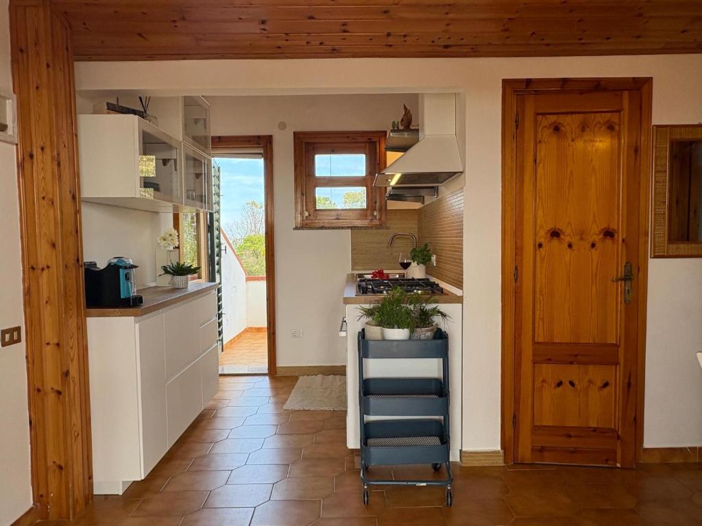 Kuchyň nebo kuchyňský kout v ubytování Bedda Casa Al Mare