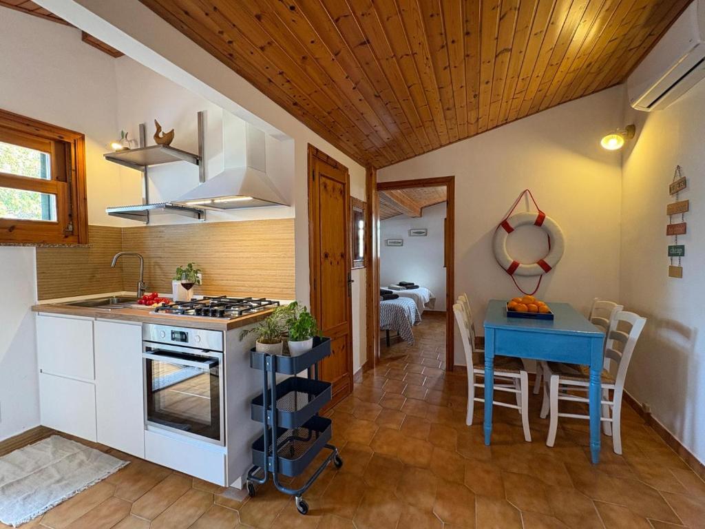 Kuchyň nebo kuchyňský kout v ubytování Bedda Casa Al Mare