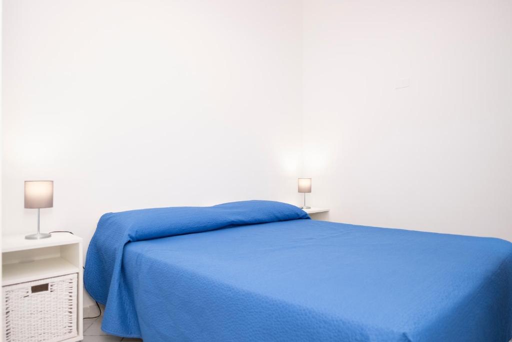 Posteľ alebo postele v izbe v ubytovaní Appartamento Cortese a due Passi dal Mare