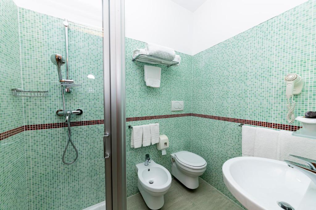 Koupelna v ubytování Hotel Alba