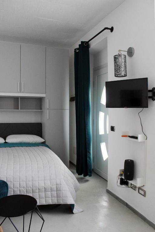 Postel nebo postele na pokoji v ubytování Inn Joy
