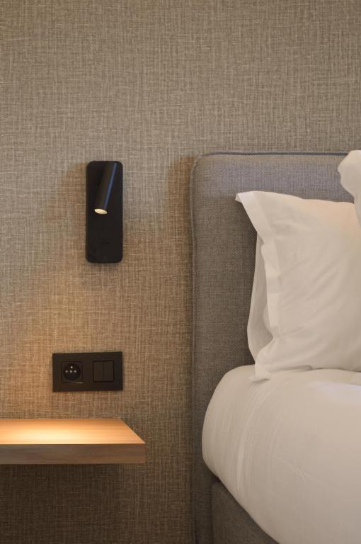 Postel nebo postele na pokoji v ubytování Hotel De Zalm
