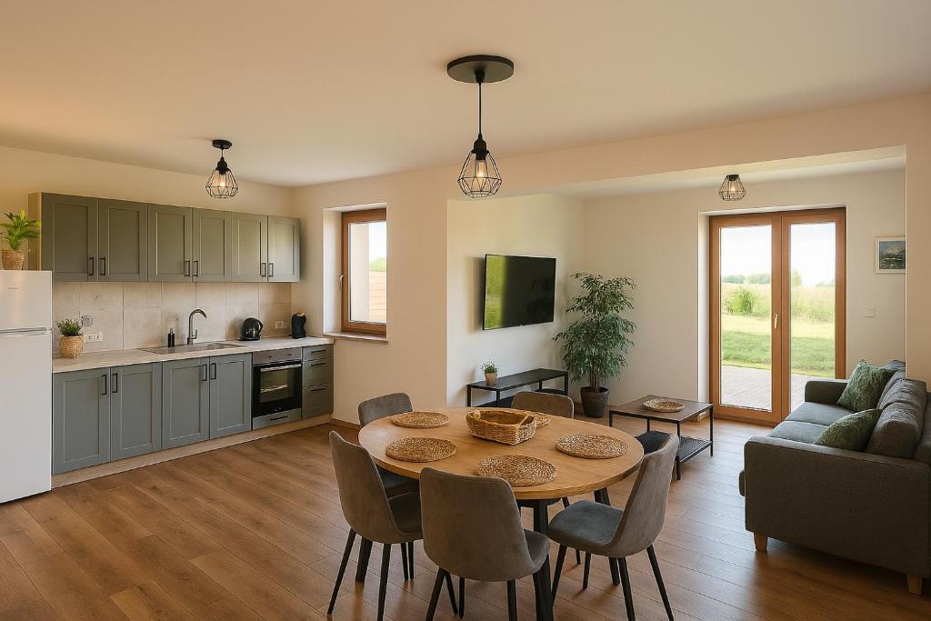 Kuchyňa alebo kuchynka v ubytovaní Apartamenty u Moni