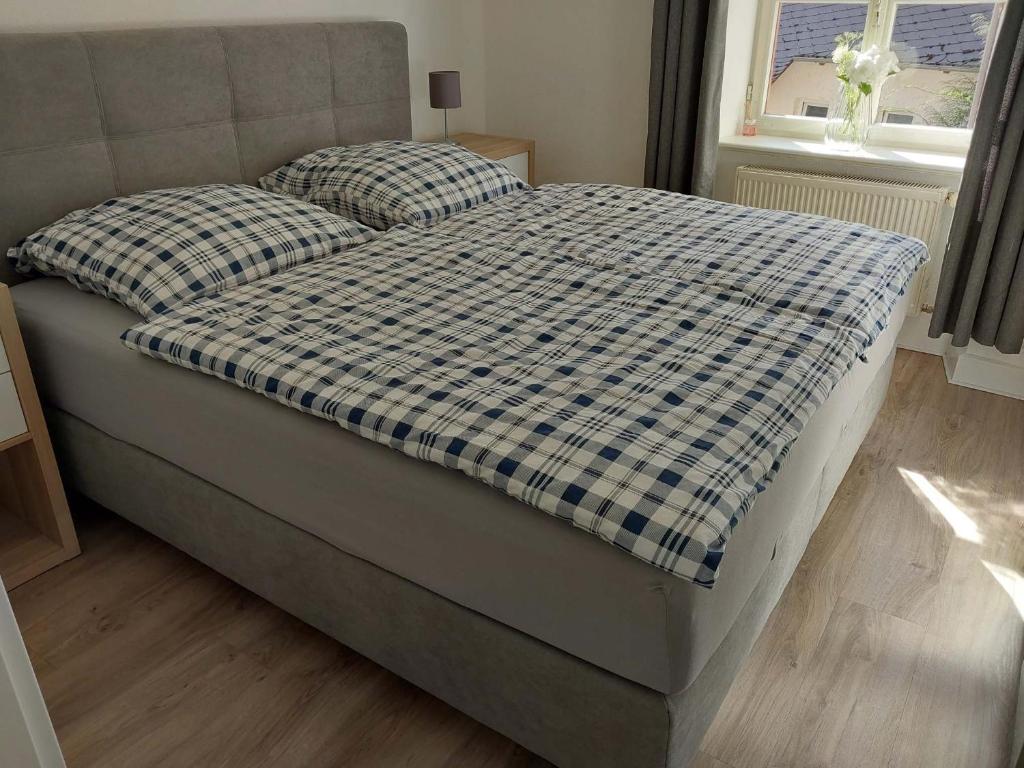 En eller flere senge i et værelse på Marie