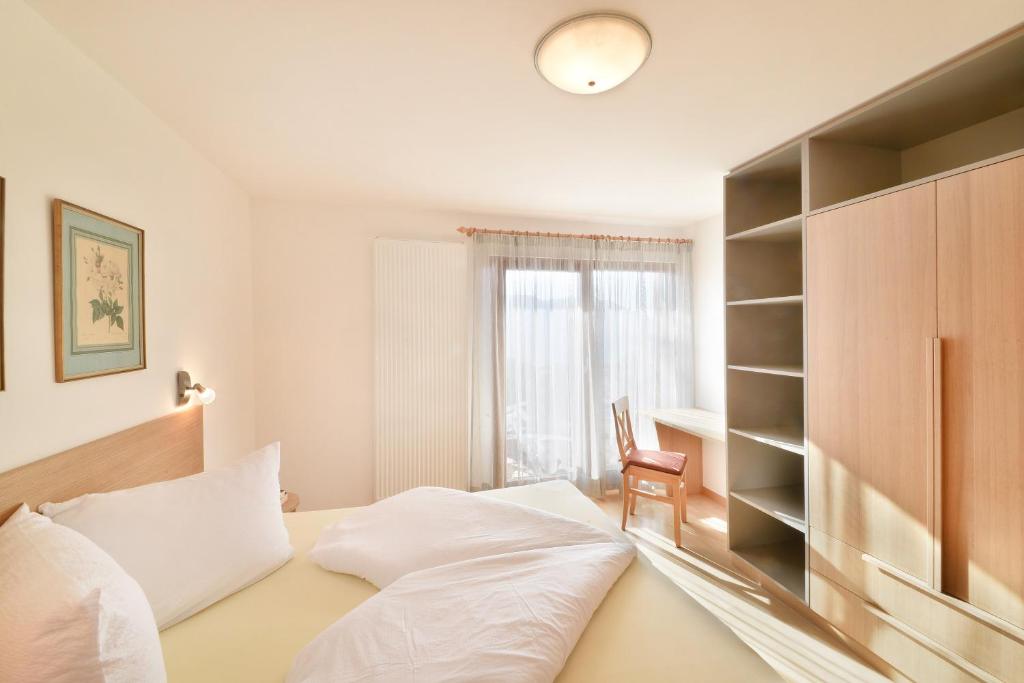 Postel nebo postele na pokoji v ubytování Haus Rosengarten