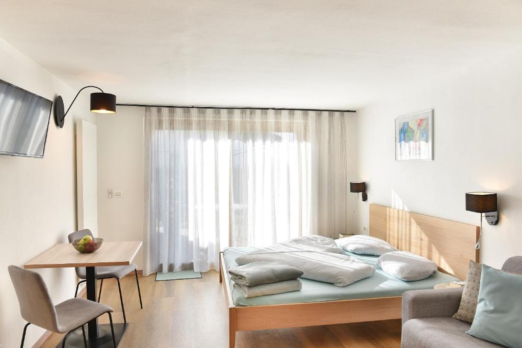 Postel nebo postele na pokoji v ubytování Haus Rosengarten