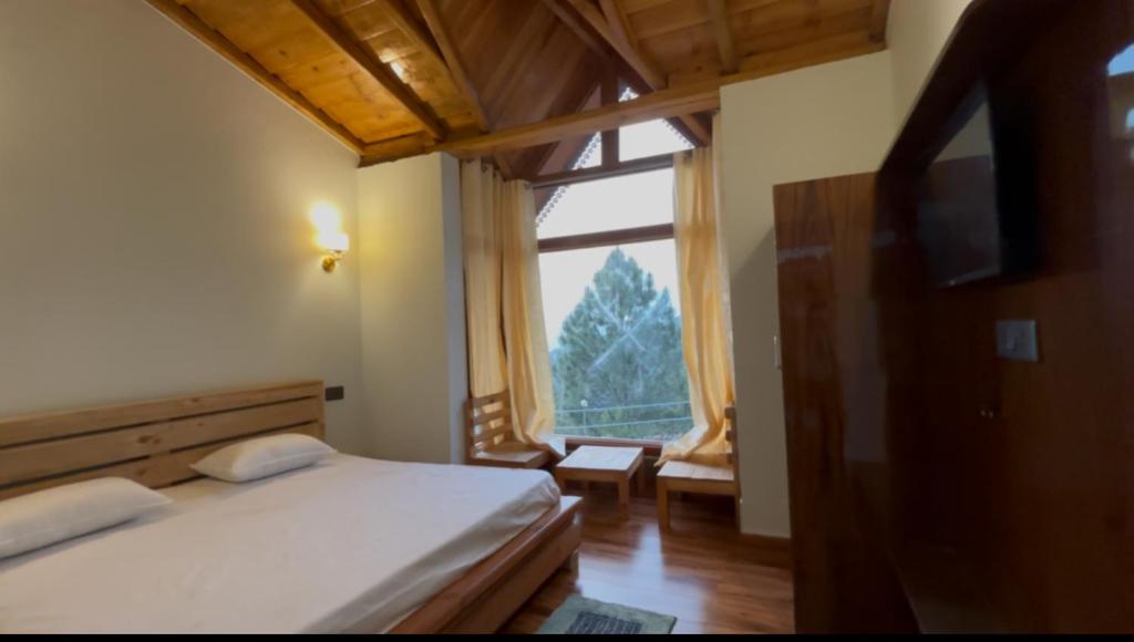 Postel nebo postele na pokoji v ubytování mandeva
