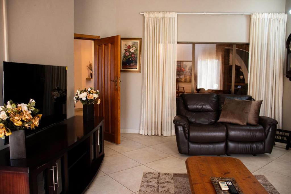TV o dispositivi per l'intrattenimento presso The Garden Manor