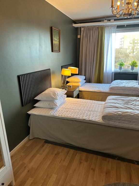 Voodi või voodid majutusasutuse Esplanadens vandrarhem i Oxelösund toas