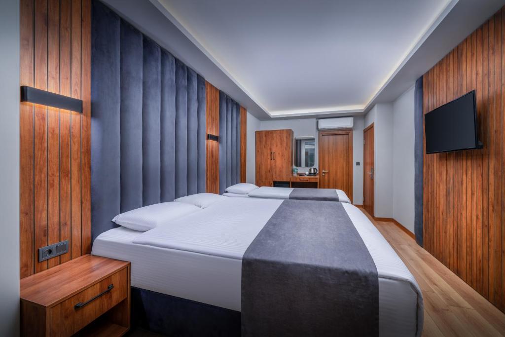 Uma TV ou centro de entretenimento em Elite Hotels Istanbul Airport