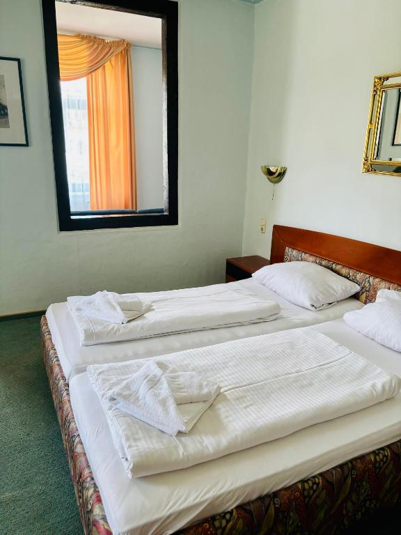 Postel nebo postele na pokoji v ubytování Themenhotel Rehlein