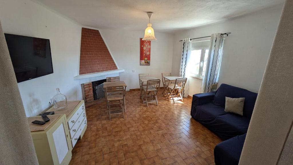 TV a/nebo společenská místnost v ubytování Rei Wamba GuestHouse