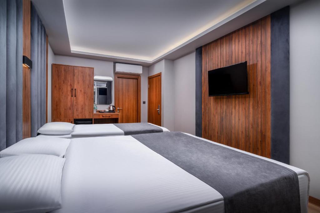 Uma TV ou centro de entretenimento em Elite Hotels Istanbul Airport