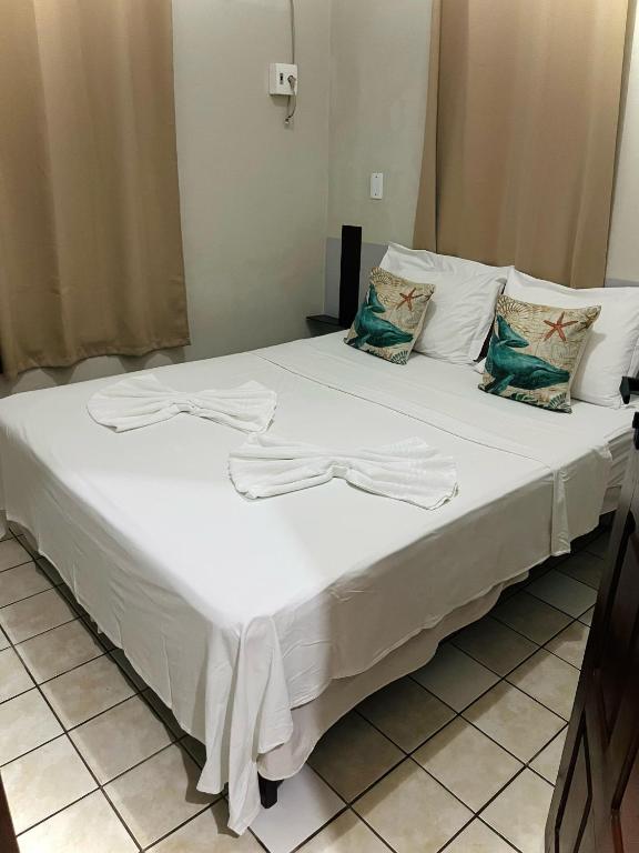 Postel nebo postele na pokoji v ubytování Casa Tua Pipa