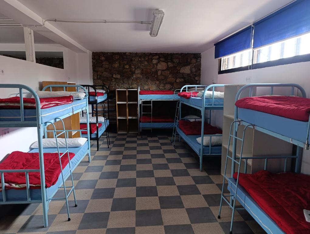 Postel nebo postele na pokoji v ubytování Albergue Villa San Clemente