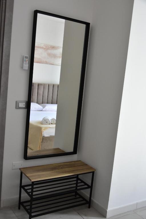 Postel nebo postele na pokoji v ubytování Yllen Rooms