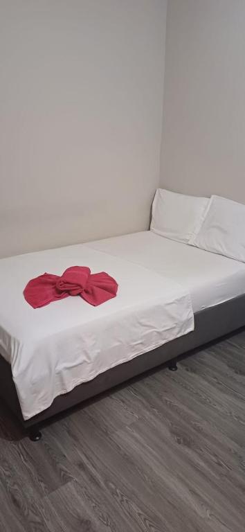 Postel nebo postele na pokoji v ubytování Hostal Machu Picchu Medellín III