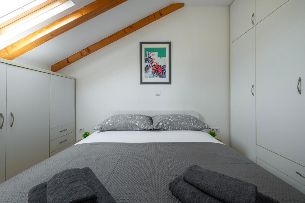 Posteľ alebo postele v izbe v ubytovaní Apartment Mirna