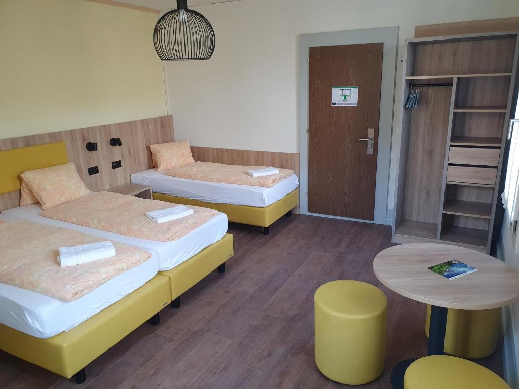 Postel nebo postele na pokoji v ubytování Budget Waldhotel Unspunnen