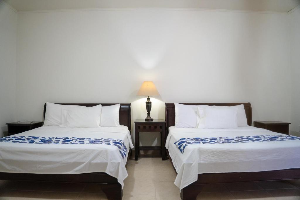 Postel nebo postele na pokoji v ubytování Casa Amalia - Jan Thiel Beach