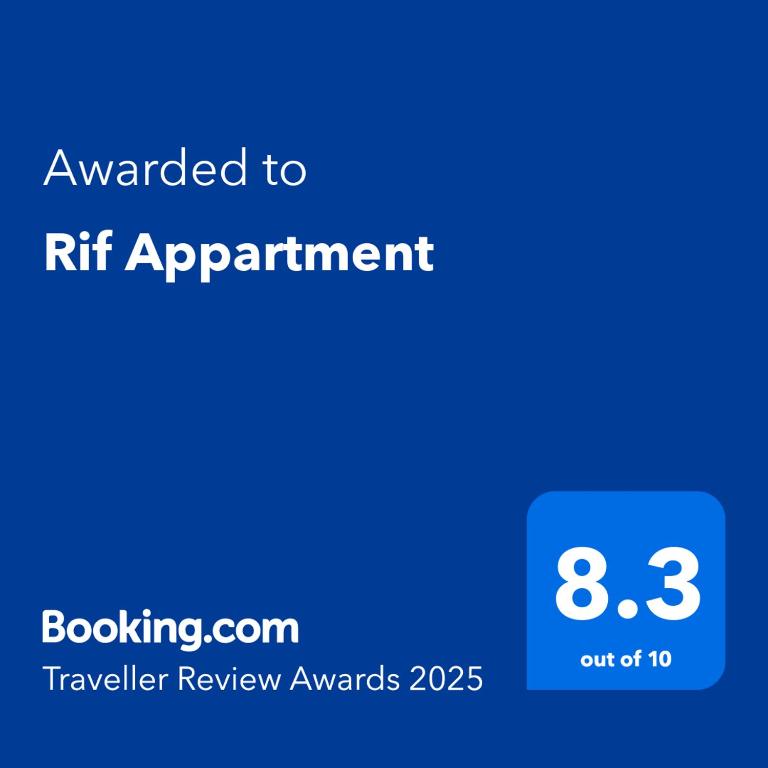 a blue sign with the text awarded to rfir appointment at Rif Appartment in Al Hoceïma