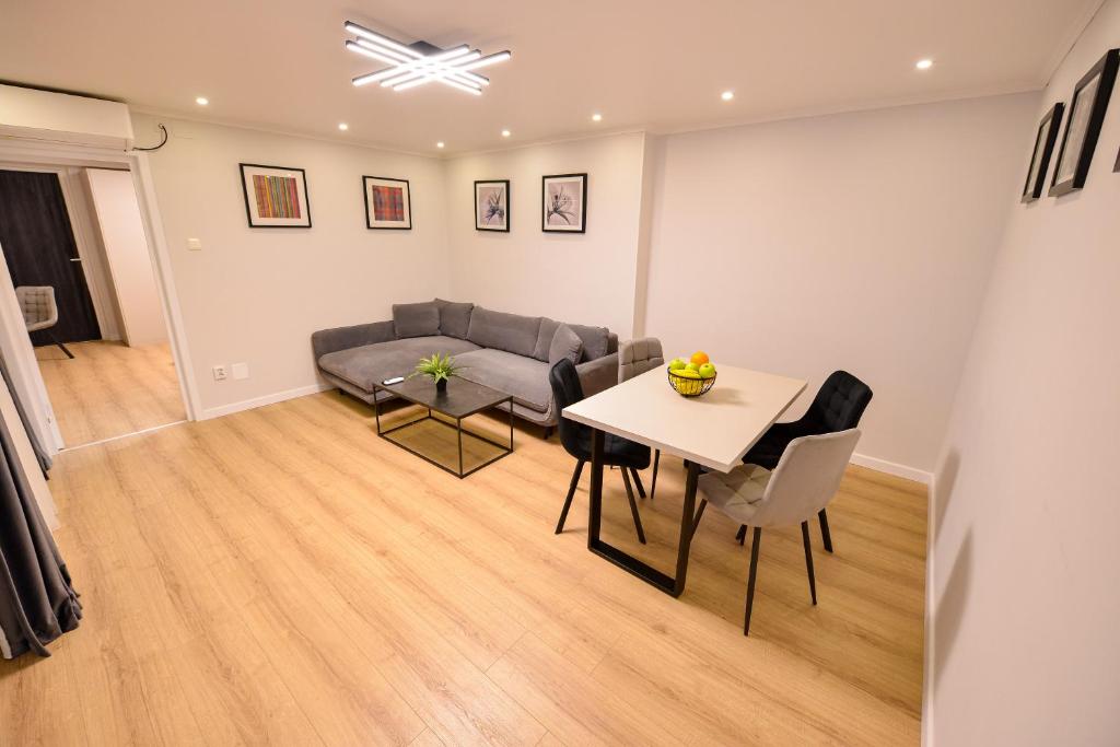 One by One - by Grand Accommodation - 
