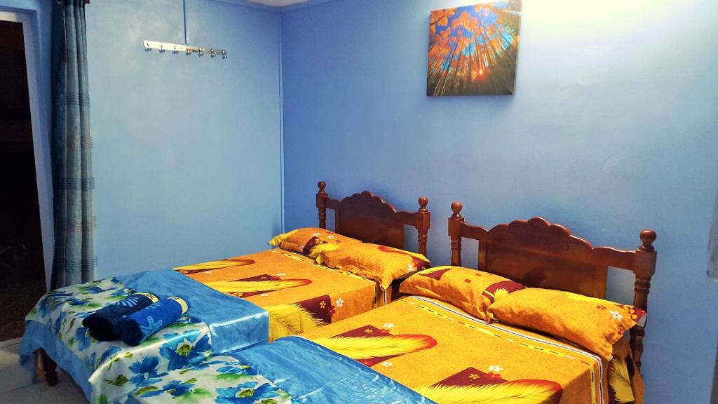 Katil atau katil-katil dalam bilik di Golden Shell Residence