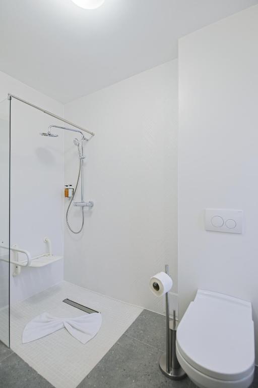 Koupelna v ubytování Potaissa Hotel