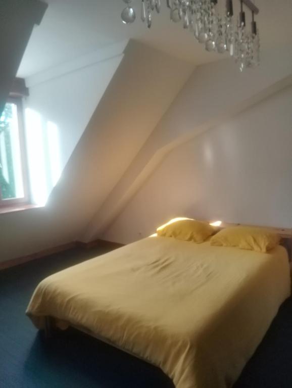 Postel nebo postele na pokoji v ubytování M1Couronne