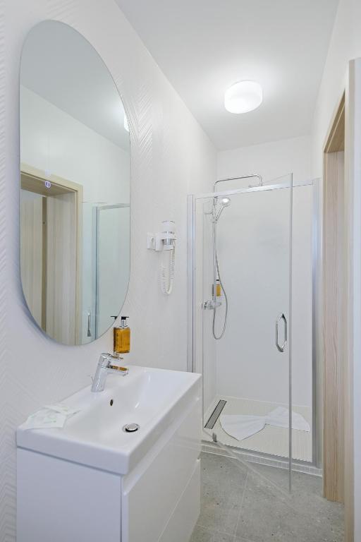Koupelna v ubytování Potaissa Hotel