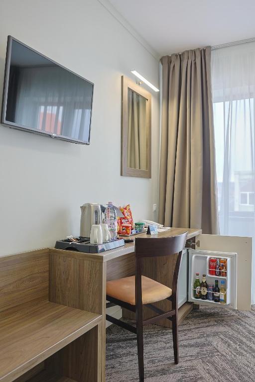 TV a/nebo společenská místnost v ubytování Potaissa Hotel