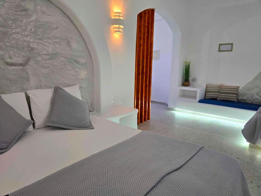 Postel nebo postele na pokoji v ubytování Papafotis Apartments & Suites