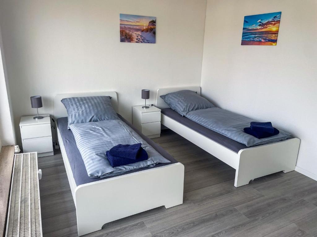 Postel nebo postele na pokoji v ubytování bookandstay24 Dietzenbach 2 Zimmerwohnung mit Balkon, Küche und Parkplatz-10