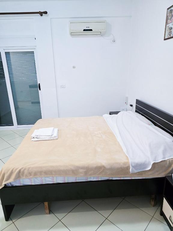 Postel nebo postele na pokoji v ubytování Azure Hotel Dhermi