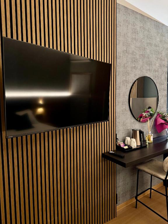 TV a/nebo společenská místnost v ubytování Villa Riviera Hotel Udine
