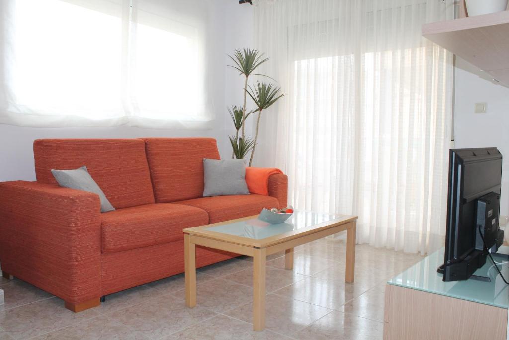 TV a/nebo společenská místnost v ubytování Apartamento Mestral en Playa de Miramar