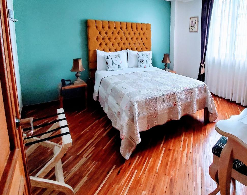 Postel nebo postele na pokoji v ubytování Casa Joaquin Boutique Hotel