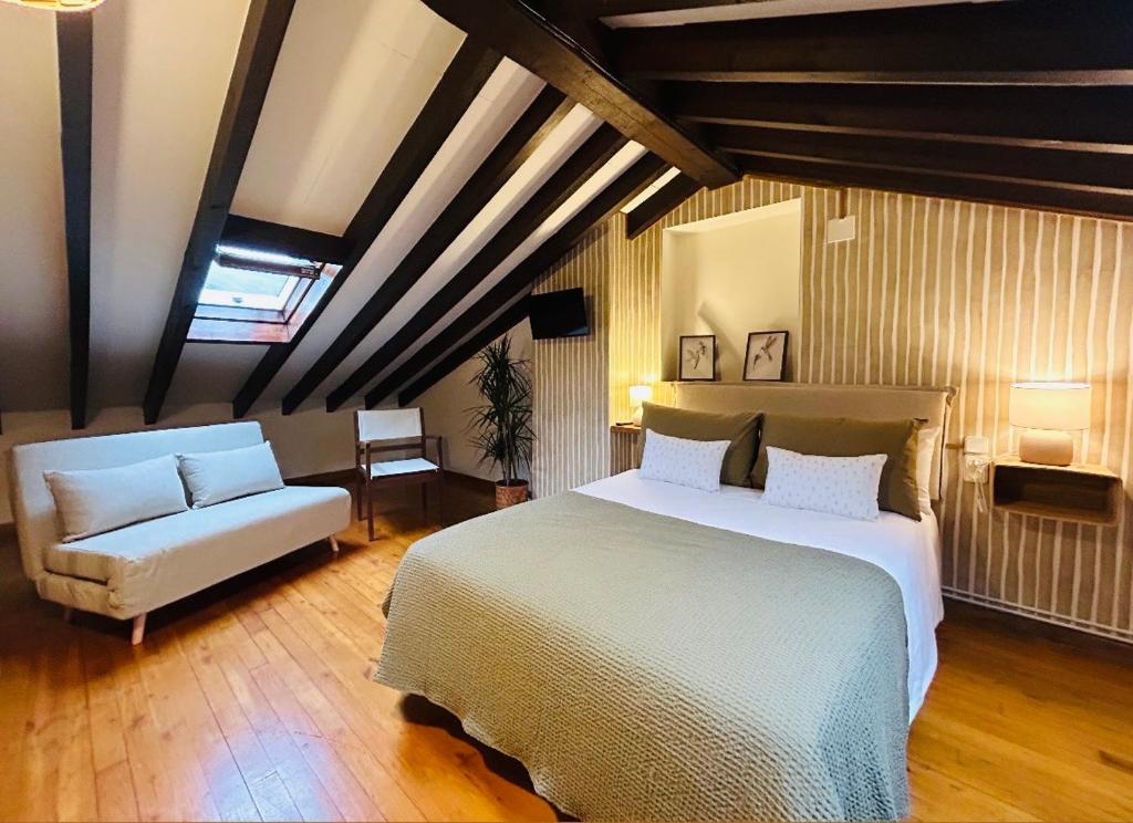 Postel nebo postele na pokoji v ubytování Casa Arenas