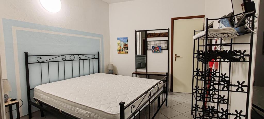 Postel nebo postele na pokoji v ubytování Monolocale Poggio