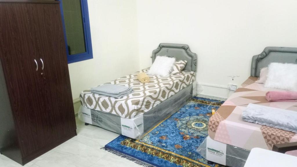 Postel nebo postele na pokoji v ubytování SALEM House Hostel Nizwa