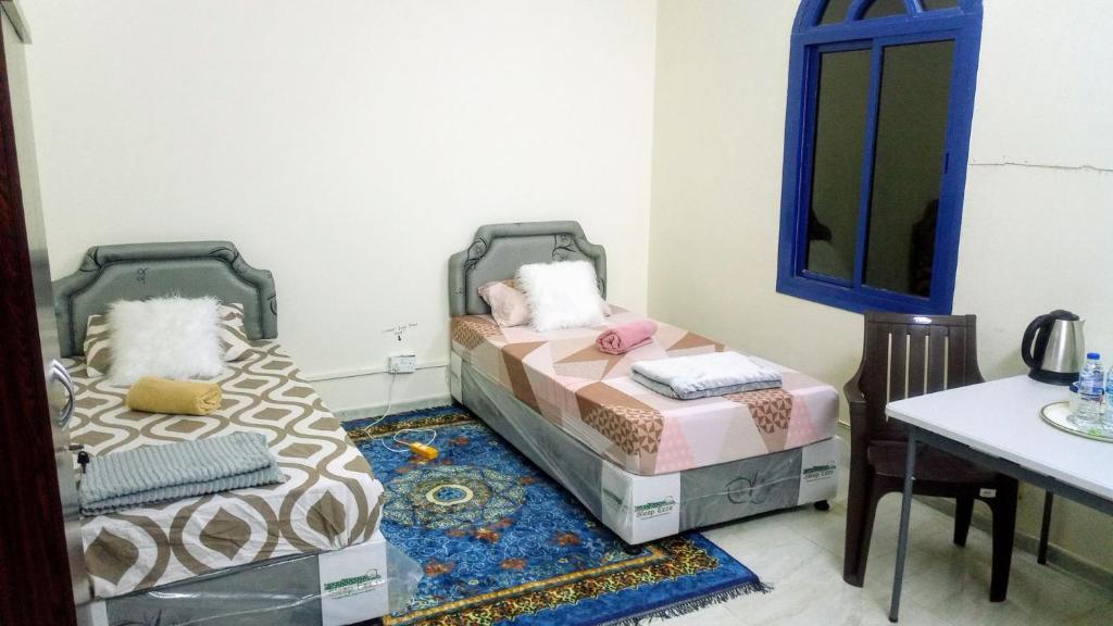 Postel nebo postele na pokoji v ubytování SALEM House Hostel Nizwa