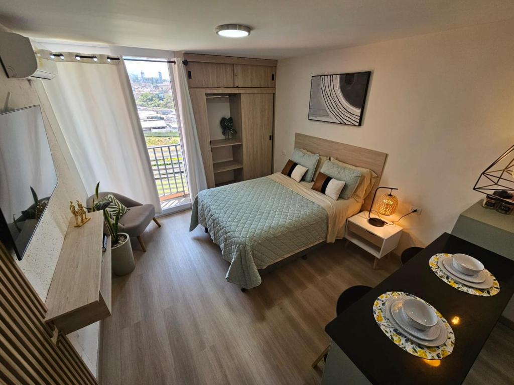 Postel nebo postele na pokoji v ubytování Opal-203 Condominio Confortable en Ecodistrito