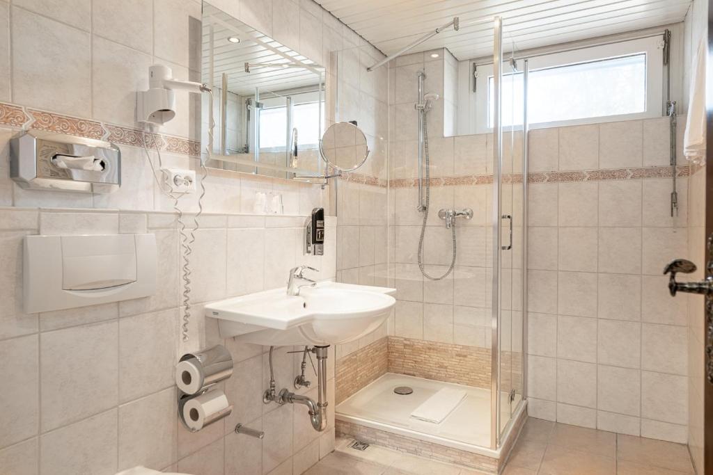 Koupelna v ubytování Hotel Zur Heidschnucke - Spa & Nature Resort