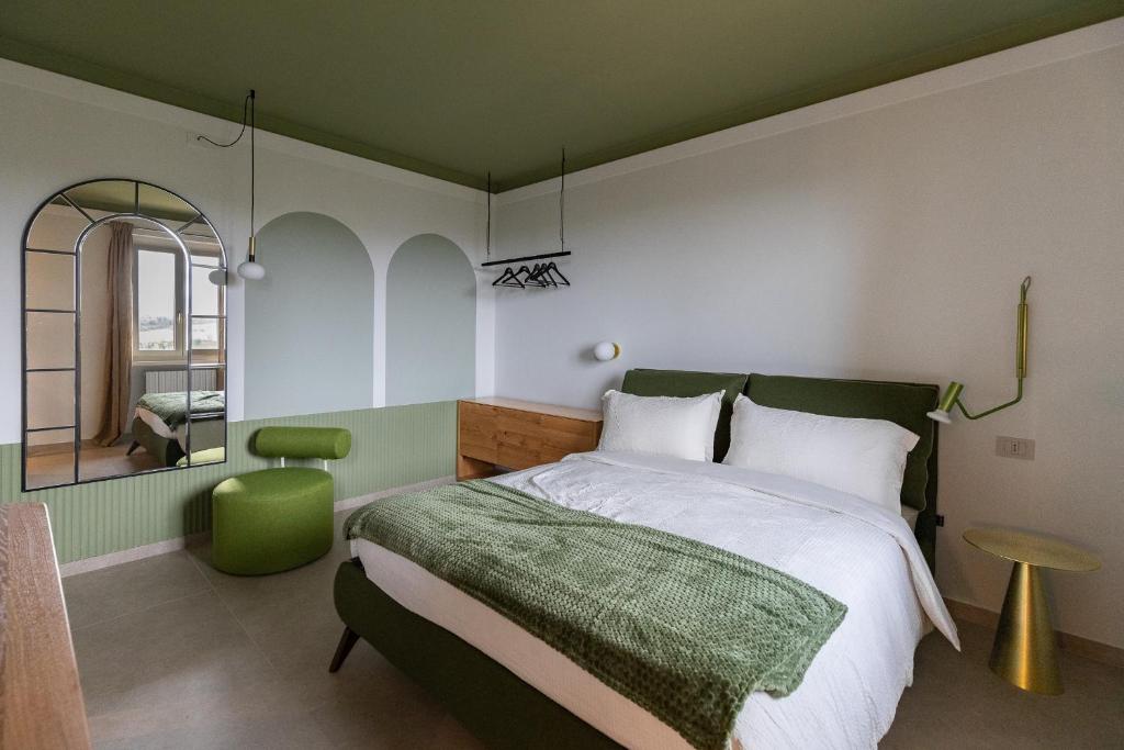 Postel nebo postele na pokoji v ubytování Agriturismo CarpinoNero