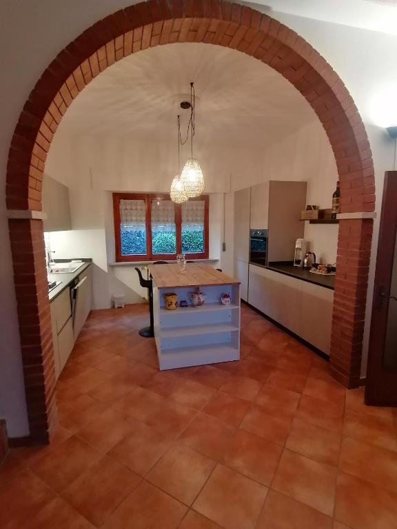 Kuchyň nebo kuchyňský kout v ubytování Villetta la Fortezza